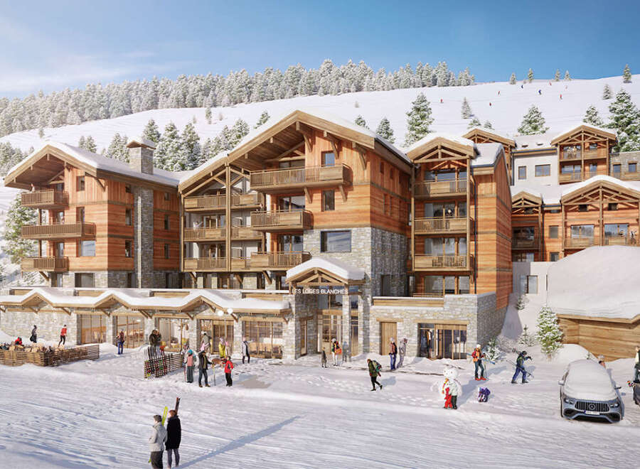 Luxury ski-in/ski-out apartments in Les Loges Blanches, offering breathtaking mountain views and direct access to the slopes.