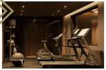 This luxurious property boasts a state-of-the-art home gym, featuring top-of-the-line equipment such as treadmills and stationary bikes.