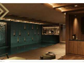 This luxurious property boasts a stunning indoor pool and a state-of-the-art gym, seamlessly integrated for a holistic wellness experience.