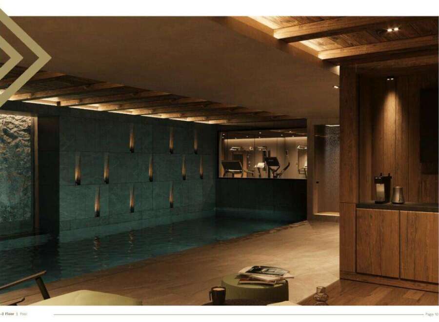 This luxurious property boasts a stunning indoor pool and a state-of-the-art gym, seamlessly integrated for a holistic wellness experience.