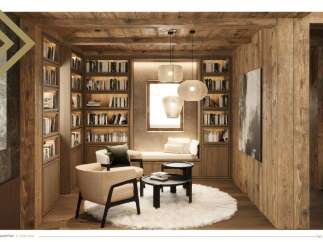 This luxurious living room boasts built-in wooden bookshelves, creating a warm and inviting atmosphere.