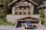 This stunning chalet boasts a prime location nestled within a lush forest, offering breathtaking views and ultimate privacy.