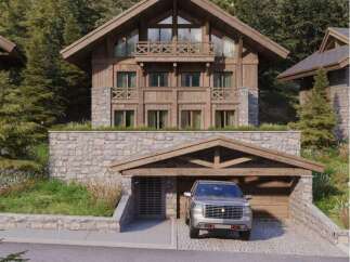 This stunning chalet boasts a prime location nestled within a lush forest, offering breathtaking views and ultimate privacy.