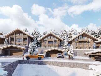 Luxury chalet-style homes nestled in a snowy mountain setting, offering stunning views and ample parking.