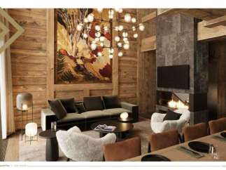 This luxurious chalet boasts a spacious living room with a stunning stone fireplace, plush seating, and large artwork.
