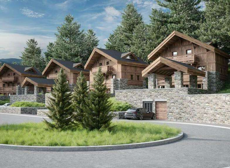Luxury chalet development nestled in a scenic mountainside setting.