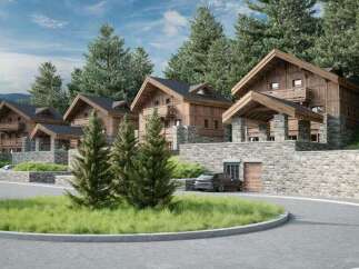Luxury chalet development nestled in a scenic mountainside setting.