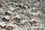 Discover luxurious chalet living in this stunning snow-covered mountain village.