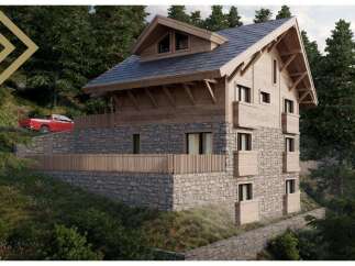 This stunning chalet boasts a unique blend of wood and stone, offering breathtaking views of the surrounding forest.