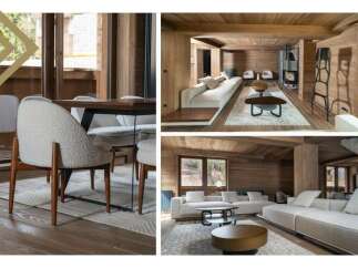 This stunning chalet boasts a spacious open-plan living area with floor-to-ceiling windows offering breathtaking views, complemented by a cozy fireplace and luxurious furnishings.