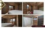 These luxurious bedrooms boast stunning mountain views and are finished with rich wood paneling.