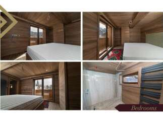These luxurious bedrooms boast stunning mountain views and are finished with rich wood paneling.