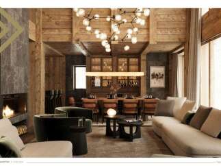 This luxurious living room boasts a stunning wooden ceiling, a cozy fireplace, and ample seating for guests.