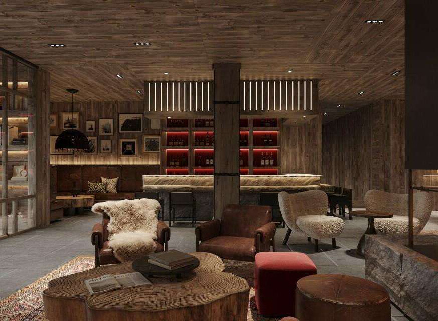 This luxurious lodge boasts a stunning lobby with a rustic-chic design, featuring a large stone fireplace, comfortable leather armchairs, and a unique wooden coffee table.