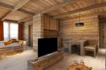 This stunning chalet boasts a cozy living space with exposed wooden beams, a flat-screen TV, and a rustic dining area.