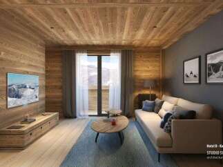 This stunning hotel room boasts a cozy living area with a comfortable sofa, a large TV, and a wooden coffee table.