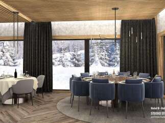 This stunning restaurant boasts floor-to-ceiling windows showcasing breathtaking snowy mountain views, creating a serene and elegant ambiance.
