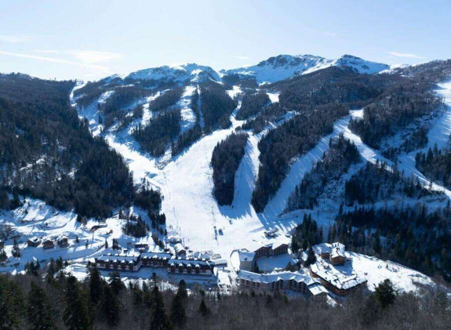 Nestled in a stunning snow-covered mountain range, this resort offers breathtaking views and easy access to various ski slopes.