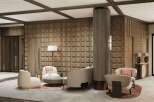 This stunning hotel lobby boasts a sophisticated design with a wood-paneled feature wall, plush seating areas, and a striking central column.