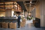 This stunning restaurant boasts a sleek, modern design with a warm, inviting atmosphere.