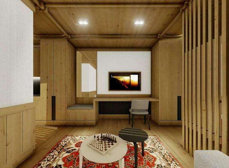 This stunning property boasts a spacious and bright living area with a cozy wooden interior.