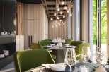 This stunning restaurant boasts a sophisticated design with floor-to-ceiling windows offering breathtaking views, complemented by warm wood accents and stylish green velvet chairs.