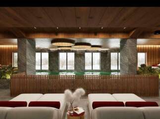 Indulge in tranquility at our luxurious spa, featuring a stunning indoor pool surrounded by floor-to-ceiling windows offering breathtaking views.