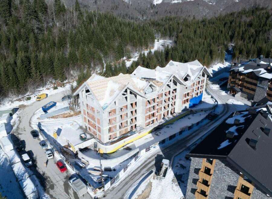 This stunning property boasts breathtaking mountain views and is located in a prime ski resort location.