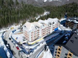 This stunning property boasts breathtaking mountain views and is located in a prime ski resort location.