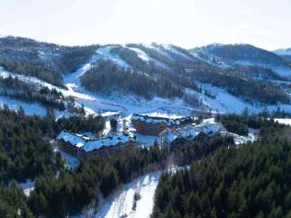 Nestled in a snowy mountainside, this resort boasts stunning views and ski-in/ski-out access.