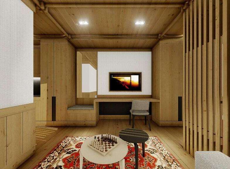 This stunning property boasts a spacious and bright living area with a cozy wooden interior.