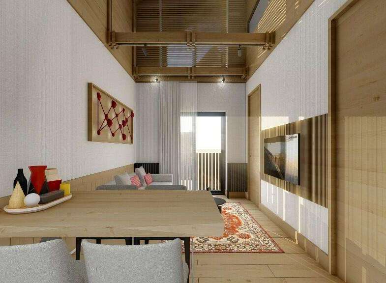 This stunning apartment boasts a spacious open-plan living area with a sleek modern kitchen and dining area.