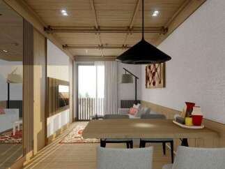 This stunning apartment boasts a spacious open-plan living area with a modern dining table and comfortable seating, perfect for entertaining guests.