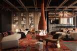 Luxury lodge with a stunning fireplace as the centerpiece, surrounded by comfortable seating and a sophisticated bar.