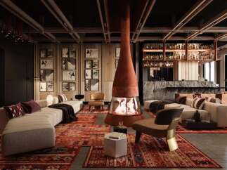 Luxury lodge with a stunning fireplace as the centerpiece, surrounded by comfortable seating and a sophisticated bar.