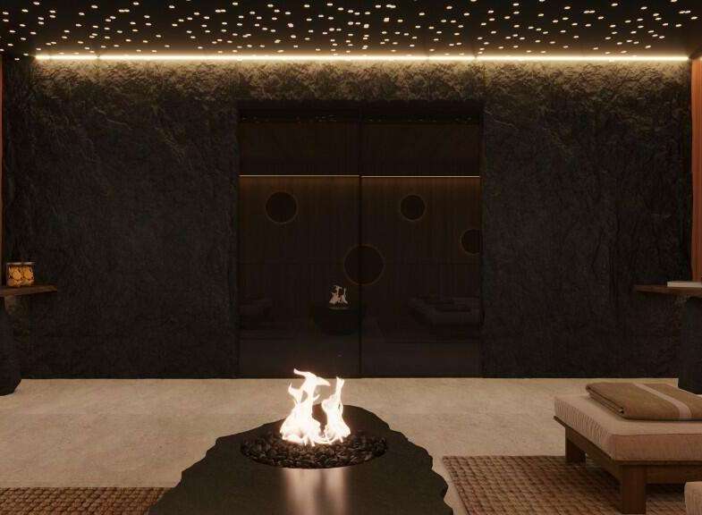Indulge in tranquility at this luxurious spa, featuring a stunning fire pit as its centerpiece.
