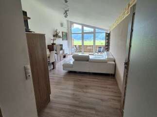 Discover a bright and airy living space with stunning mountain views.