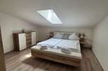 Discover a cozy bedroom retreat with a modern design.