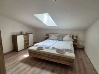 Discover a cozy bedroom retreat with a modern design.