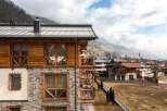 Experience the charm of this stunning property, featuring a blend of wood and stone architecture.
