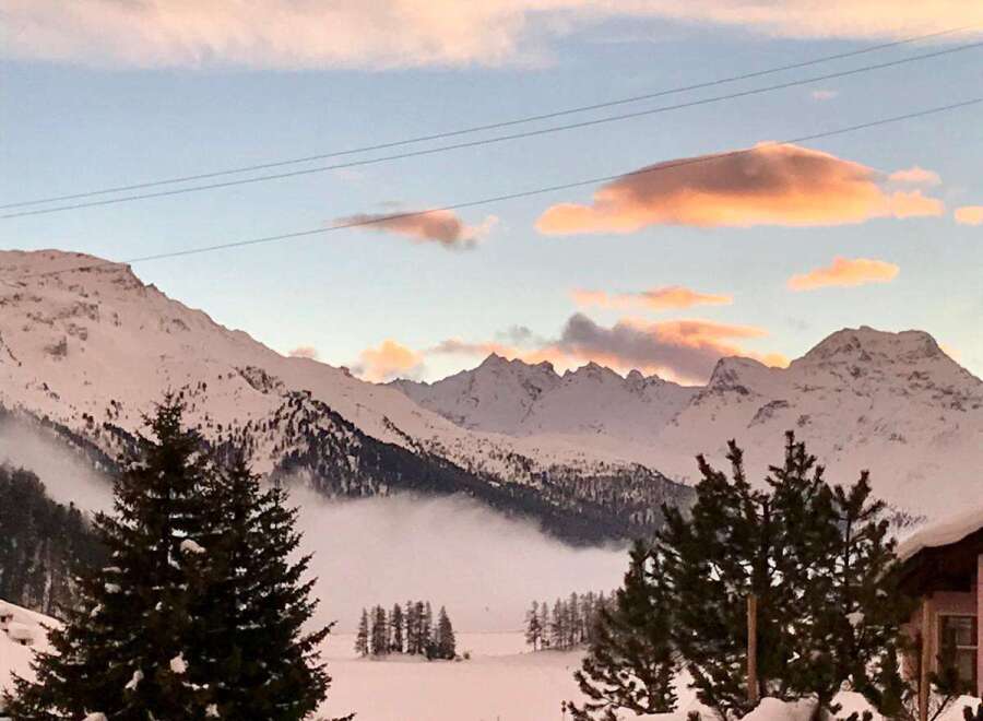 Experience the breathtaking beauty of the snow-capped mountains and serene landscapes.