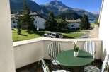 Enjoy breathtaking mountain views from this charming balcony.