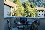 Enjoy breathtaking mountain views from this charming balcony.
