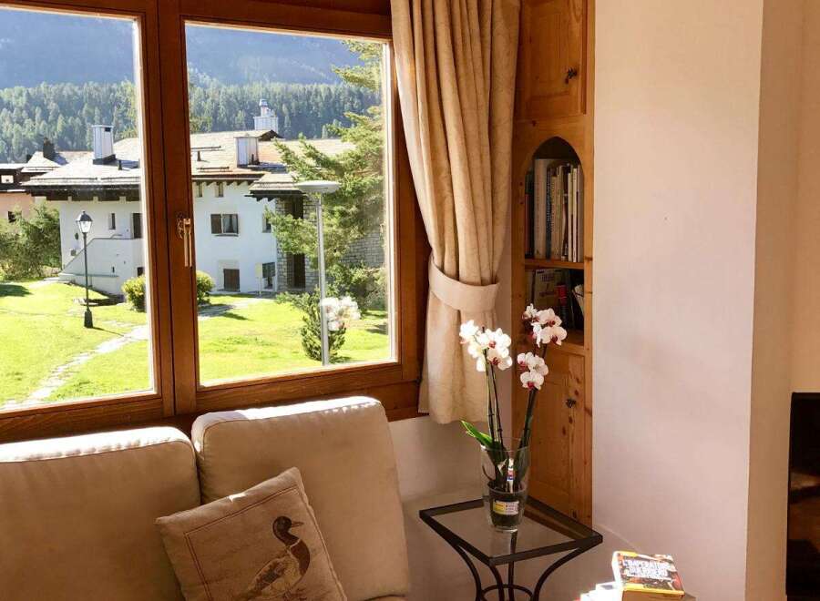 Enjoy the stunning views from this cozy living space.