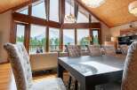 Luxurious chalet with breathtaking views of a snow-capped mountain.