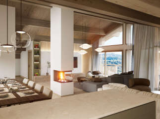 This stunning chalet boasts an open-plan living area with a cozy fireplace, perfect for entertaining guests.