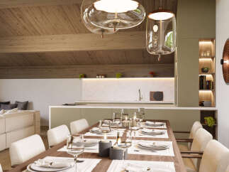This stunning property boasts a spacious open-plan living area with a modern kitchen and a large dining table perfect for entertaining.