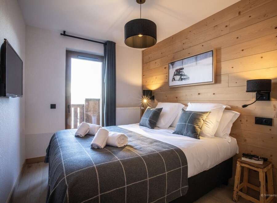 Cozy bedroom with a modern touch.