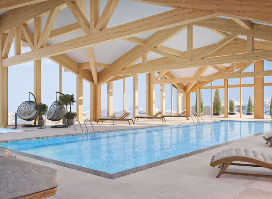 Experience luxury in this stunning indoor pool with breathtaking mountain views.