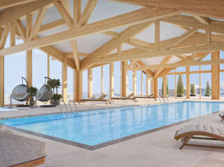 Experience luxury in this stunning indoor pool with breathtaking mountain views.